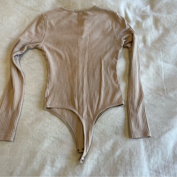 Cream/coral cozy bodysuit with buttons up the front - Picture 3 of 9